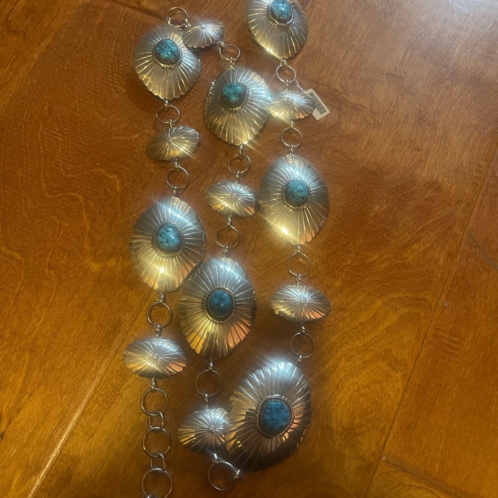 Authentic sterling silver and turquoise handcrafted belt.